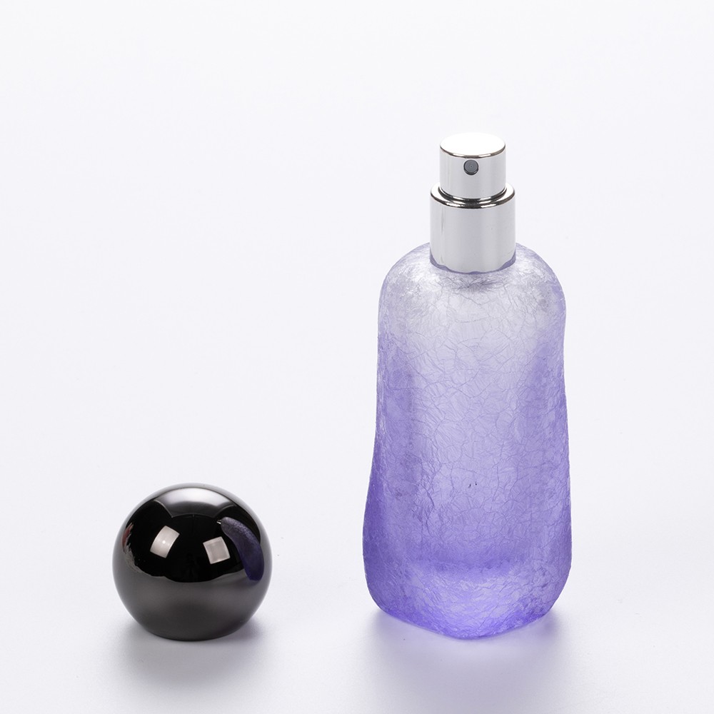 High Quality Luxury 100ml Ice Flower Finish irregular Round Glass Bottle Manufacturer Spray Perfume Bottles With Black Lid 